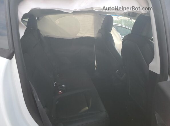 7SAYGDEFXNF452780 2022 TESLA MODEL White Հետևի նստատեղերի տեսք