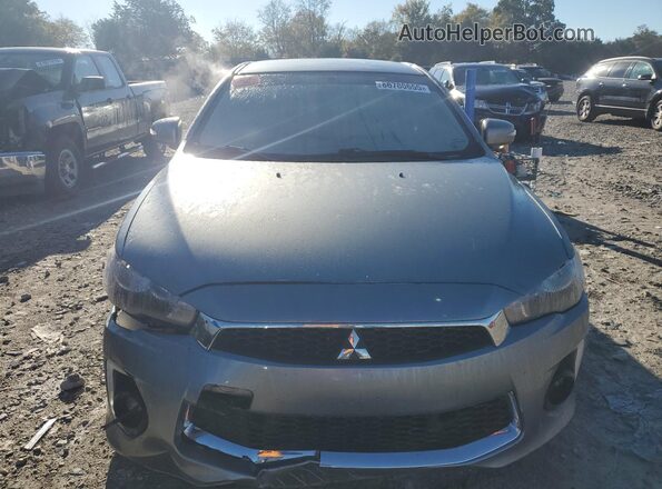 JA32V2FWXGU010098 2016 MITSUBISHI LANCER Gray Widok z przodu