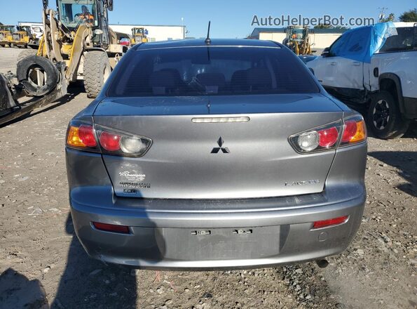 JA32V2FWXGU010098 2016 MITSUBISHI LANCER Gray Widok z tyłu