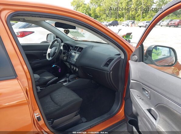 JA4APUAU4MU020057 2021 MITSUBISHI OUTLANDER SPORT Orange Front interior view