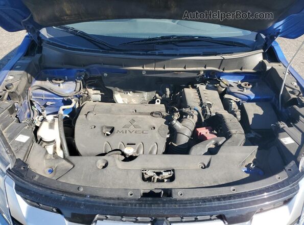 JA4APVAU8MU010217 2021 MITSUBISHI OUTLANDER Blue Vista del compartimento del motor