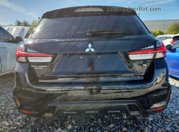 JA4APVAU9MU029973 2021 MITSUBISHI OUTLANDER Black Вид ззаду