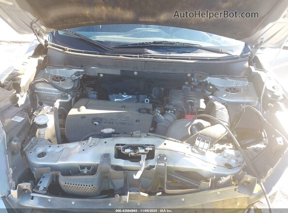 JA4AR3AU2LU016107 2020 MITSUBISHI OUTLANDER SPORT Silver Вид ззаду