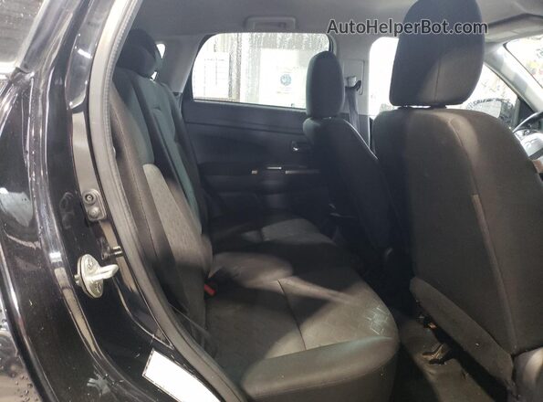 JA4AR3AU4LU018795 2020 MITSUBISHI OUTLANDER Black Widok wnętrza z tyłu
