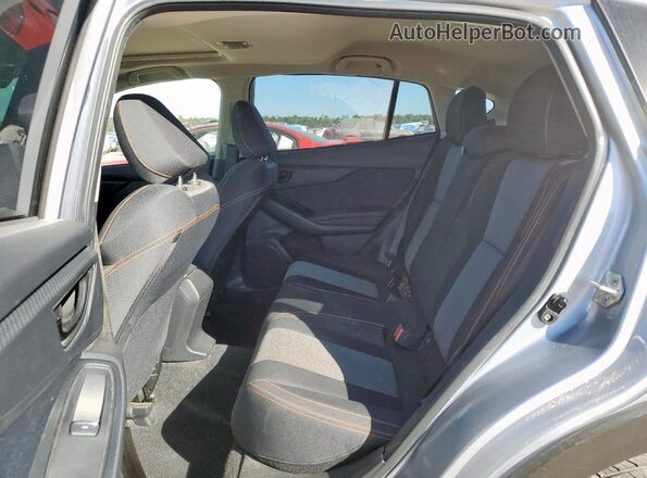 JF2GTAEC5NH276246 2022 SUBARU CROSSTREK Silver Vista interior trasera