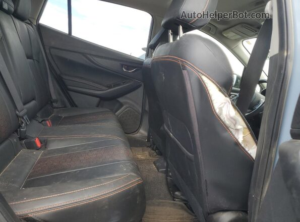 JF2GTHMC1N8254822 2022 SUBARU CROSSTREK Blue Vista interior trasera