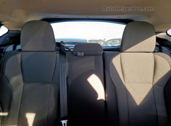JF2GUABC1SH221094 2025 SUBARU CROSSTREK Blue Vista de los asientos traseros