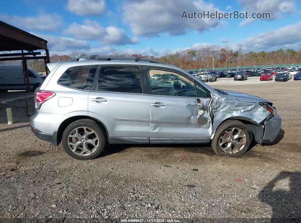 JF2SJAWC6HH464003 2017 SUBARU FORESTER 2.5I TO Silver Vista interior trasera