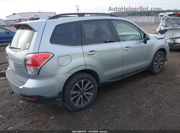 JF2SJGEC6HH451398 2017 SUBARU FORESTER2. Silver Trasero derecho
