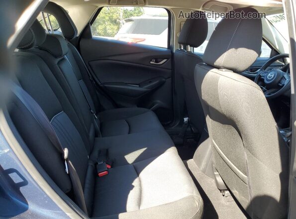 JM1DKFB76L1471447 2020 MAZDA CX-3 Blue უკანა სალონის ხედი