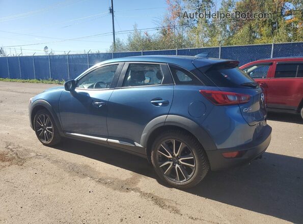 JM1DKFD76J0331432 2018 MAZDA CX-3 Blue უკანა მარცხენა