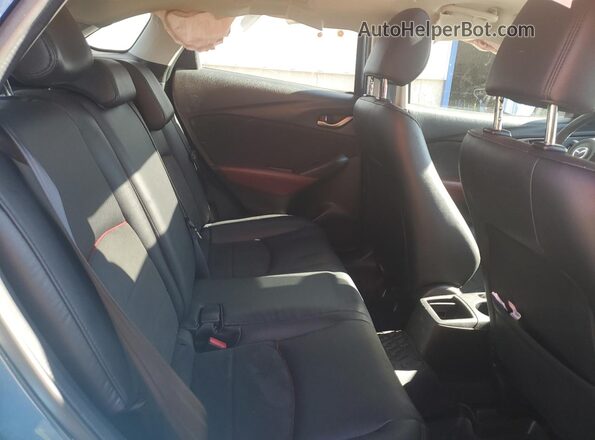 JM1DKFD76J0331432 2018 MAZDA CX-3 Blue უკანა სალონის ხედი