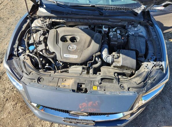 JM1GL1WY7M1608784 2021 MAZDA 6 Blue Rear interior view