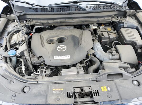 JM3KFBAY4N0607704 2022 MAZDA CX-5 Blue Rear interior view