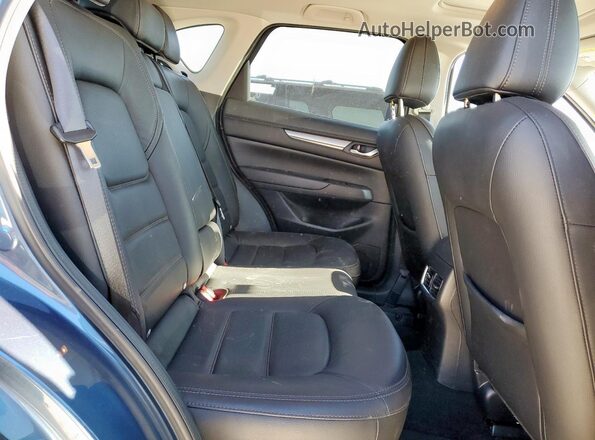 JM3KFBCM7N1632990 2022 MAZDA CX-5 Blue Vista interior trasera