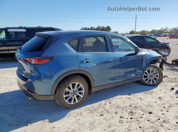 JM3KFBCM7N1632990 2022 MAZDA CX-5 Blue Trasero derecho