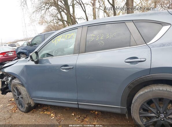 JM3KFBCMXN0532310 2022 MAZDA CX-5 Blue Rear interior view