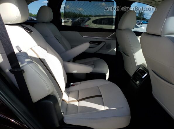 JM3KKDHC9R1103943 2024 MAZDA CX-90 Burgundy Widok wnętrza z tyłu