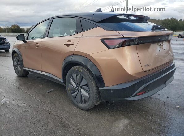JN1DF0CD1RM730183 2024 NISSAN ARIYA Gold Trasero izquierdo