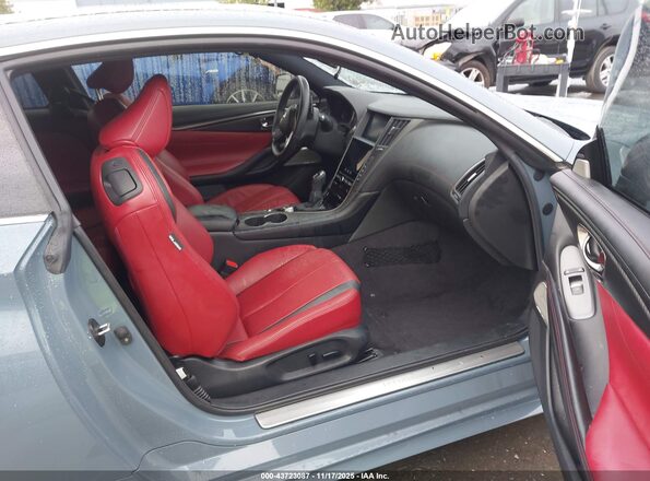 JN1FV7LKXMM530513 2021 INFINITI Q60 Light Blue Front interior view