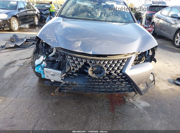 JTHP9JBH7M2044065 2021 LEXUS UX 250H Gray Вид спереду