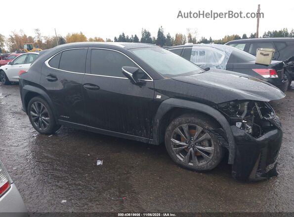 JTHU9JBH1K2012373 2019 LEXUS UX 250H Black Rear interior view
