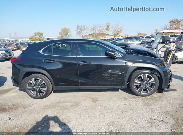 JTHX9JBH4N2058412 2022 LEXUS UX Black Vista interior trasera