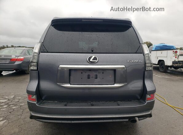 JTJAM7BX4P5376402 2023 LEXUS GX Gray Rear view