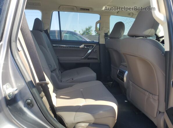 JTJAM7BX6P5378734 2023 LEXUS GX Gray Widok wnętrza z tyłu