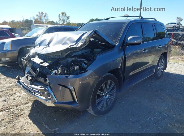 JTJHY7AX1G4202121 2016 LEXUS LX 570 Gray Front left
