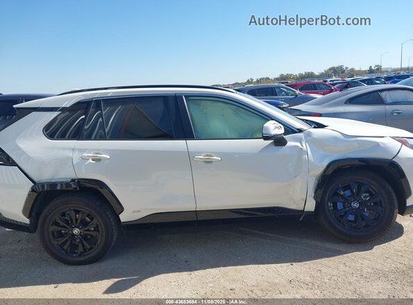 JTM16RFV4ND518879 2022 TOYOTA RAV4 HYBRID White 