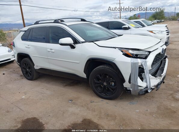 JTM16RFV6ND077109 2022 TOYOTA RAV4 HYBRID White Вид задньої частини салону