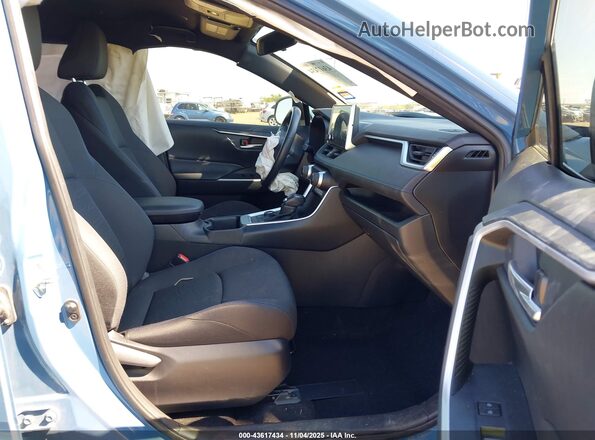 JTM16RFV7PD091796 2023 TOYOTA RAV4 HYBRID Blue Front interior view