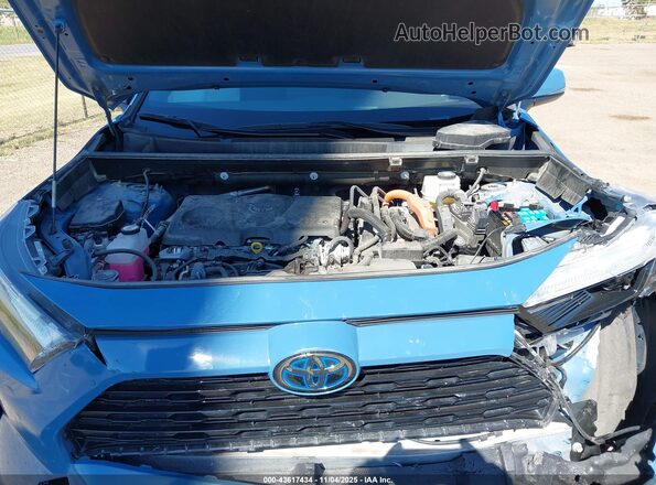JTM16RFV7PD091796 2023 TOYOTA RAV4 HYBRID Blue Rear view