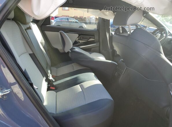 JTMABABA4PA009301 2023 SUBARU SOLTERRA Серый Вид задней части салона
