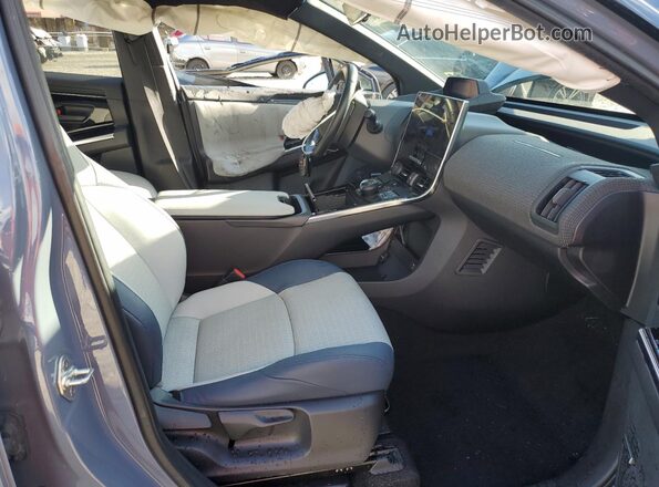 JTMABABA4PA009301 2023 SUBARU SOLTERRA Серый Вид салона спереди