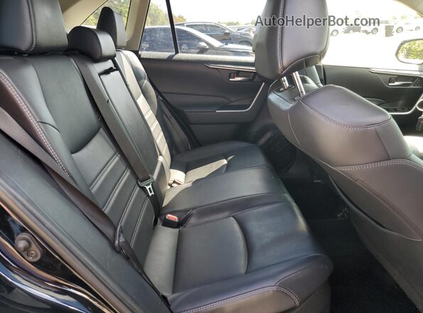 JTMB6RFV0PD080224 2023 TOYOTA LE Black Вид задньої частини салону