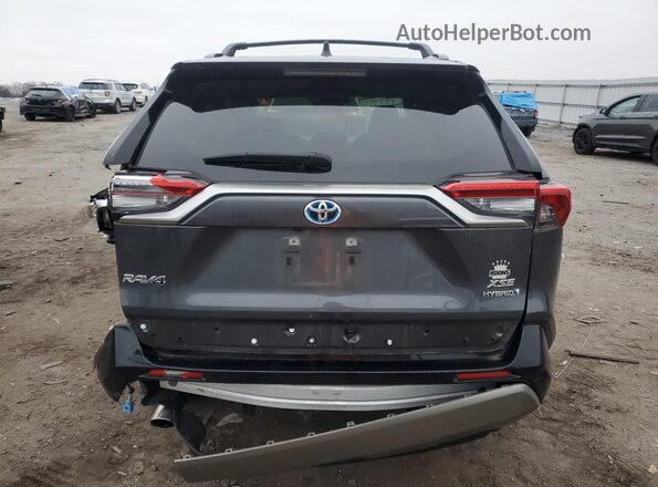 JTME6RFV3ND527963 2022 TOYOTA RAV4 Gray Vista trasera