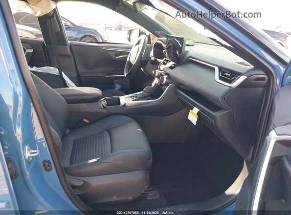 JTME6RFV9SD580520 2025 TOYOTA RAV4 HYBRID Blue Widok wnętrza z przodu