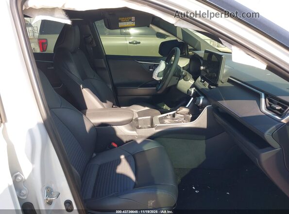 JTME6RFVXSD572572 2025 TOYOTA RAV4 HYBRID White წინა სალონის ხედი