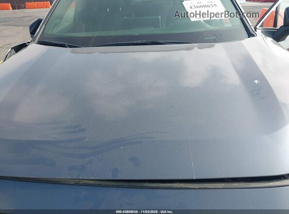 JTMEB3FV7PD148587 2023 TOYOTA RAV4 PRIME Gray Widok z tyłu