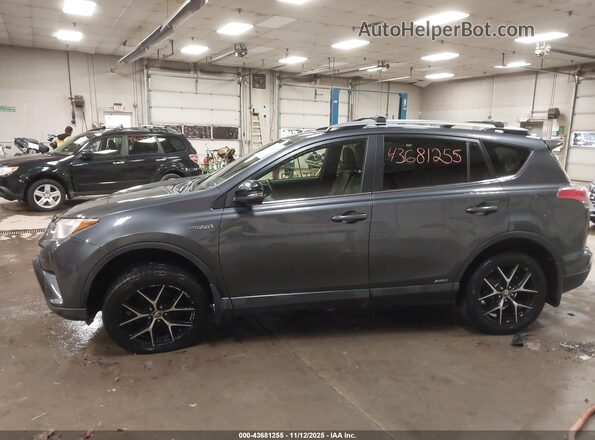 JTMJJREV4HD080725 2017 TOYOTA RAV4 HYBRID Gray Front view