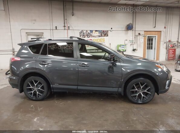 JTMJJREV4HD080725 2017 TOYOTA RAV4 HYBRID Gray Rear interior view
