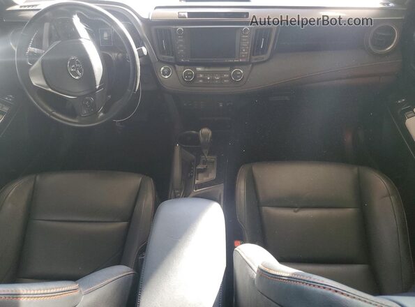 JTMNFREV3GJ092299 2016 TOYOTA RAV4 White Dashboard view