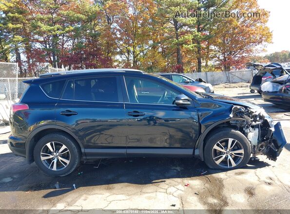 JTMRFREV4JD250219 2018 TOYOTA LE Blue Widok wnętrza z tyłu