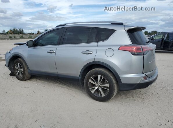 JTMWFREV3JJ212128 2018 TOYOTA RAV4 Silver Tył lewy