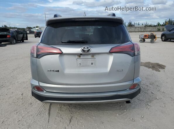 JTMWFREV3JJ212128 2018 TOYOTA RAV4 Silver Widok z tyłu
