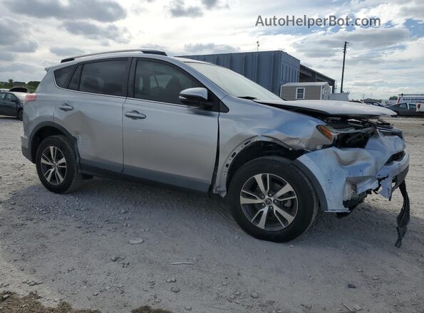 JTMWFREV3JJ212128 2018 TOYOTA RAV4 Silver Przód prawy