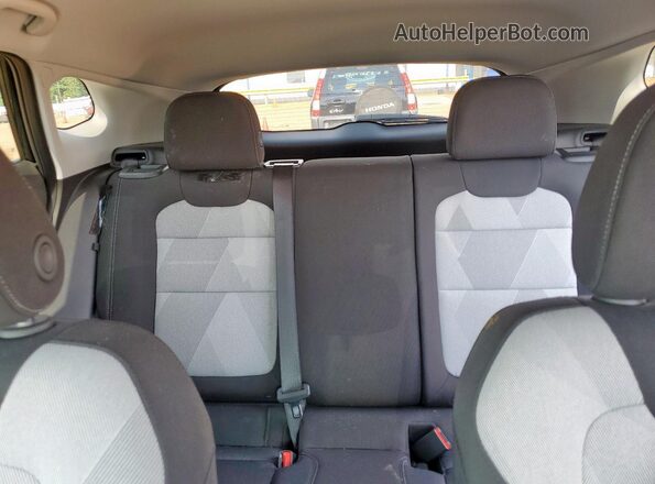 KL77LFEP9SC044852 2025 CHEVROLET TRAX Black Vista de los asientos traseros