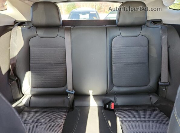 KL77LHE20RC071027 2024 CHEVROLET TRAX Black Հետևի նստատեղերի տեսք
